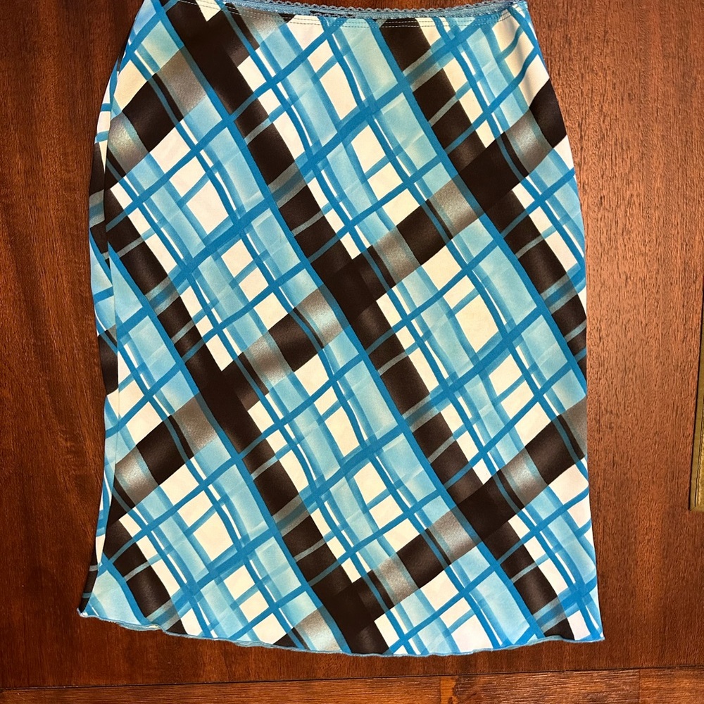 Indeed brand multi-colored skirt with cross pattern.